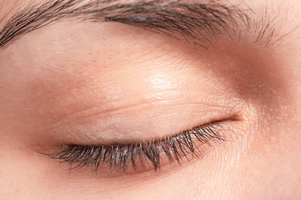Close-up of a woman's closed eye
